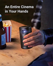 Load image into Gallery viewer, Anker Nebula Capsule, Smart Wi-Fi Mini Projector, Black, 100 ANSI Lumen Portable Projector, 360° Speaker, Movie Projector, 100 Inch Picture, 4-Hour Video Playtime, Neat Projector, Home Entertainment