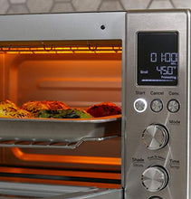 Load image into Gallery viewer, GE Convection Toaster Oven | Quartz Heating Technology | Large Capacity Toaster Oven Complete With 7 Cook Modes & Oven Accessories | Countertop Kitchen Essentials | 1500 Watts | Stainless Steel