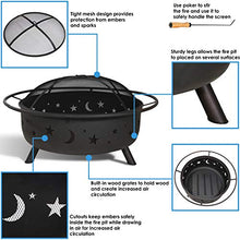 Load image into Gallery viewer, Sunnydaze Cosmic Fire Pit for Outdoors - 42-Inch Large Wood Burning Fire Pit with Moon and Stars - Perfect for Patio and Backyard Bonfires Outside - Includes Round Spark Screen, Fireplace Poker, and Metal Grate - Celestial Design