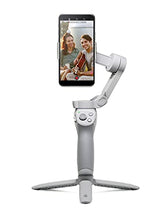 Load image into Gallery viewer, DJI OM 4 - Handheld 3-Axis Smartphone Gimbal Stabilizer with Grip, Tripod, Gimbal Stabilizer Ideal for Vlogging, YouTube, Live Video, Phone Stabilizer Compatible with iPhone and Android
