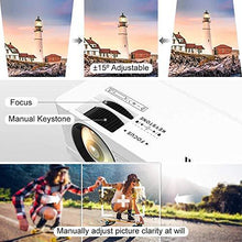 Load image into Gallery viewer, QKK Mini Projector 6500Lumens Portable LCD Projector [100" Projector Screen Included] Full HD 1080P Supported, Compatible with Smartphone, TV Stick, Games, HDMI, AV, Projector for Outdoor Movies
