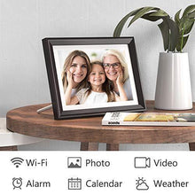 Load image into Gallery viewer, Dragon Touch Digital Picture Frame WiFi 10 inch IPS Touch Screen HD Display, 16GB Storage, Auto-Rotate, Share Photos via App, Email, Cloud - Classic 10

